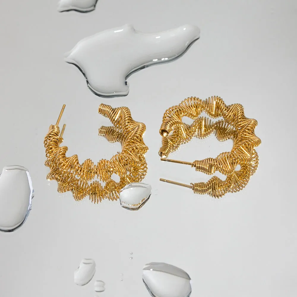 Pre Order:  Twisted C-shaped Earrings